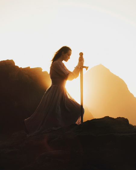 Strong confident woman with sword