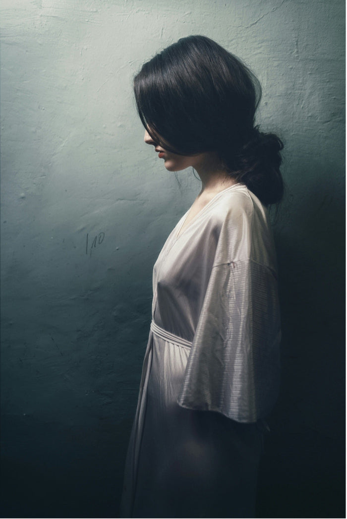 Image of woman in dark room