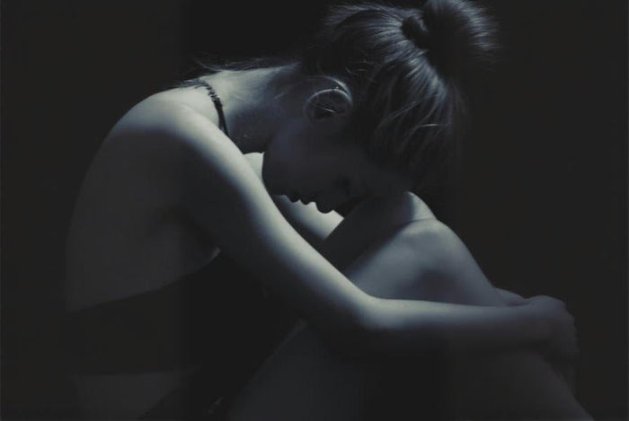 woman struggling with emotional wounds